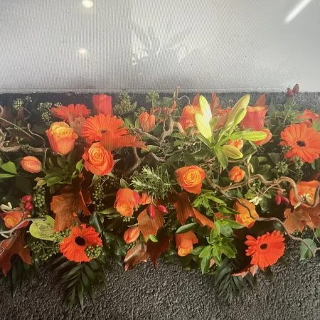 RAQUETTE COULEURS ORANGE, par A fleurs de peau, fleuriste à Les Mureaux